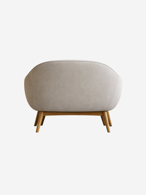 Curved ivory lounge chair
